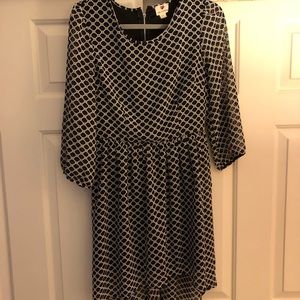 Black, blue, and white high/low dress